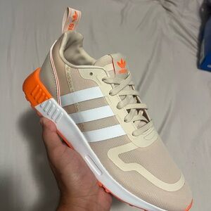 Adidas NMD R2 Trainers in Cream and Orange